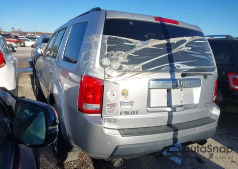 2011 Honda Pilot Touring z USA, uszkodzony, nr VIN 5FNYF4H94BB090771